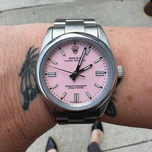 Rolex Oyster Perpetual Pink Dial Watch